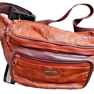 Womens Genuine Leather Fanny pack. Brand new.  Several pockets. Adjustable strap